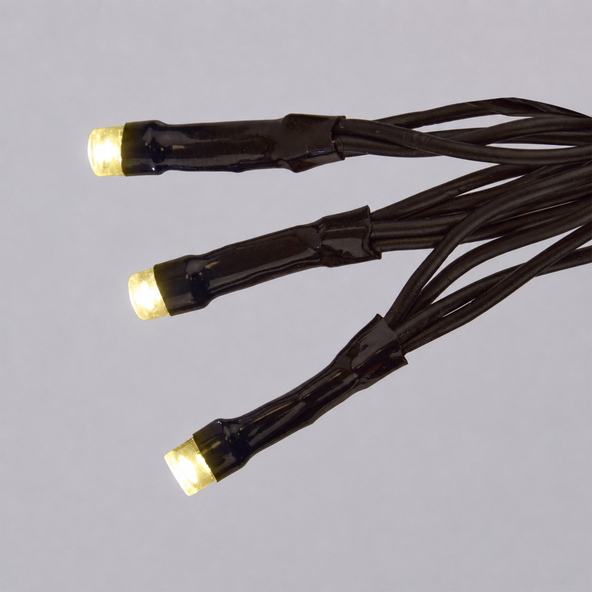 ULD-S5000-500-DBA-RC WW IP44 Гирлянда светодиодная. 50м. 500 светодиодов. Теплый белый свет. Пульт ДУ в-к. Провод черный. ТМ Uniel