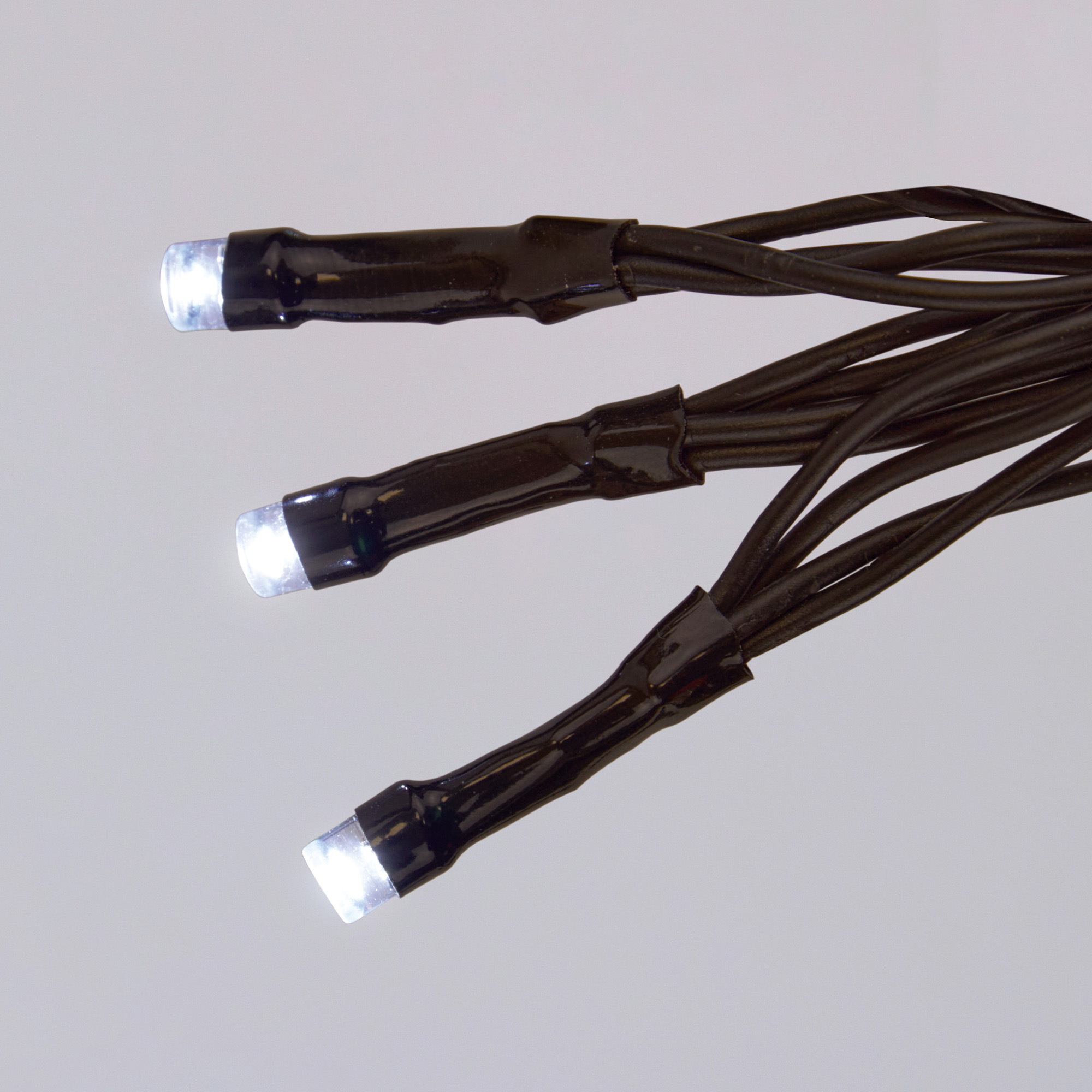 ULD-S10000-1000-DBA-RC WH IP44 Гирлянда светодиодная. 100м. 1000 светодиодов. Белый свет. Пульт ДУ в-к. Провод черный. ТМ Uniel