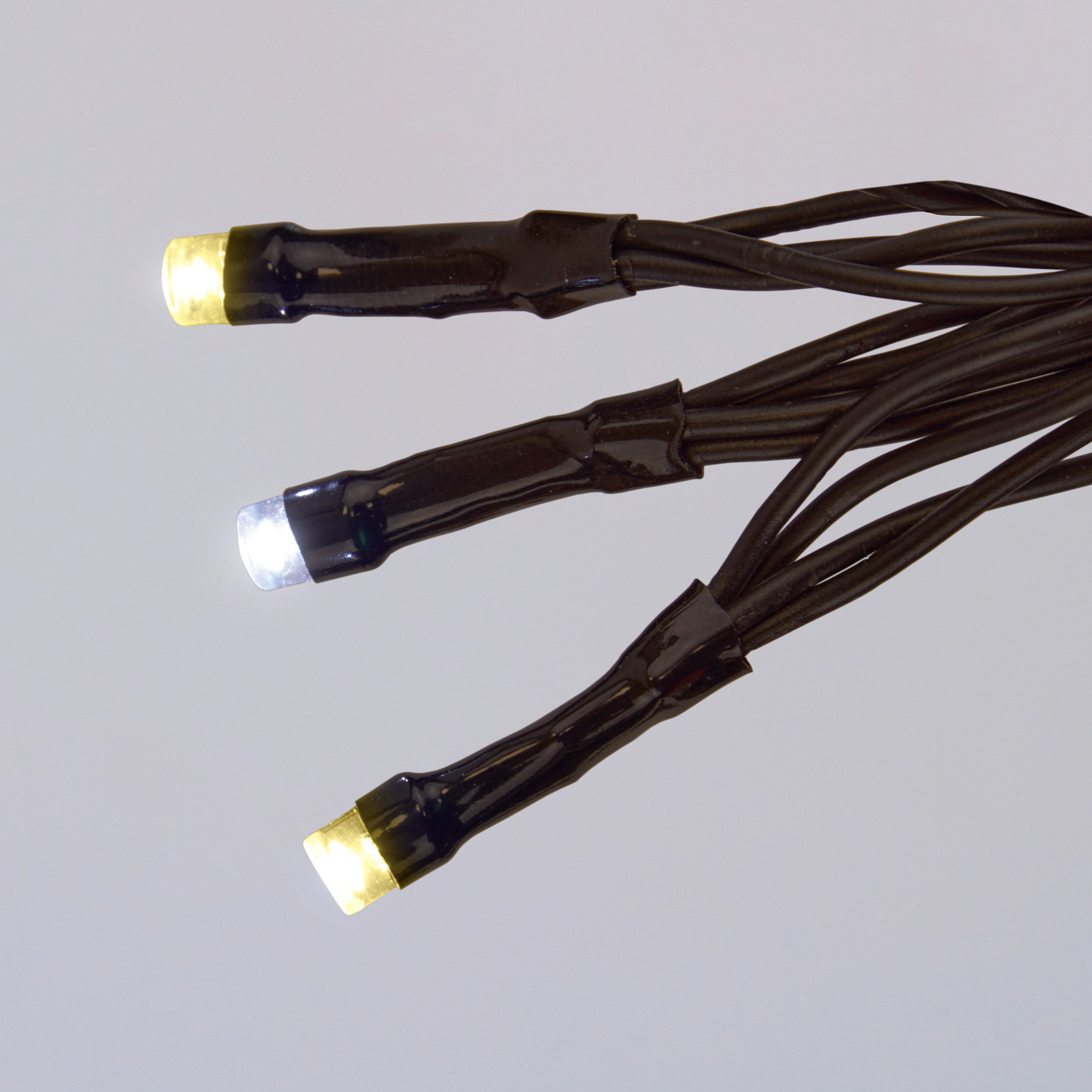ULD-S1500-150-TBK WW-WH IP44 Гирлянда светодиодная с эффектом мерцания. 15м. Соединяемая. 150 светодиодов. Теплый белый и белый свет. Провод черный. ТМ Uniel
